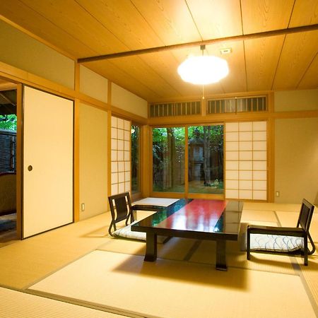 Отель Ryotei Tanokura Юфу Экстерьер фото